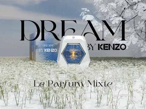 Visuel de parfum Dream by Kenzo : flacon hexagonal posé sur un champ d'herbes claires, titre en capitales fines.