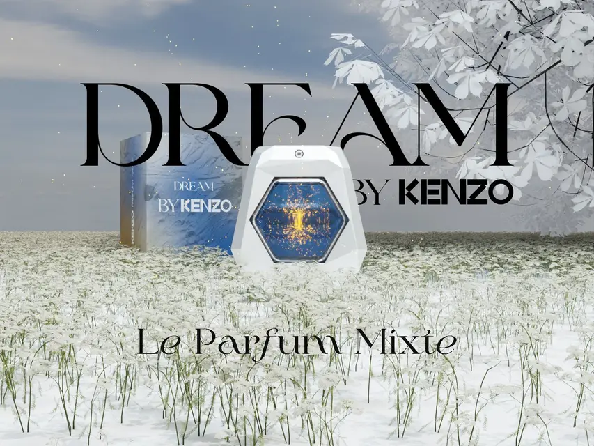 Visuel de parfum Dream by Kenzo : flacon hexagonal posé sur un champ d'herbes claires, titre en capitales fines.